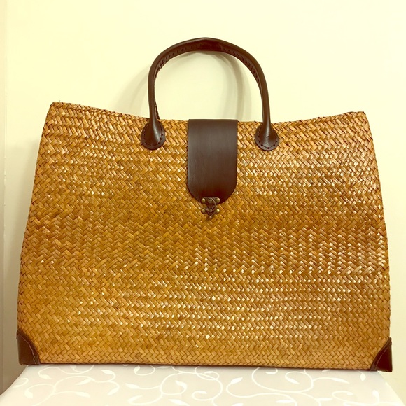 Handbags - Light brown wicker basket.